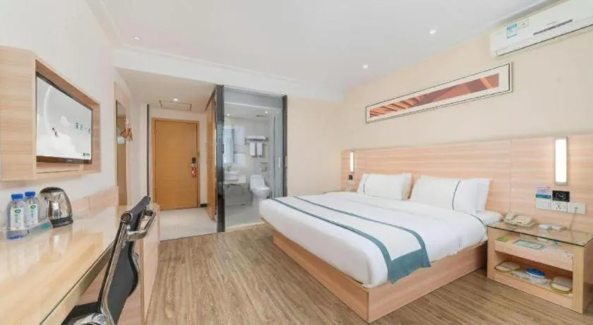 Bed in City Comfort Inn Yulin Wenhua Square Wanda Plaza