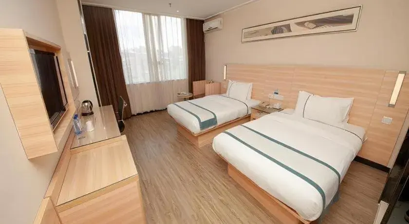 Bed in City Comfort Inn Yulin Wenhua Square Wanda Plaza Bed in City Comfort Inn Yulin Wenhua Square Wanda Plaza