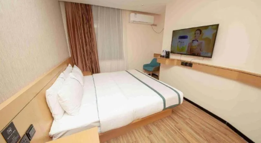 Bed in City Comfort Inn Yulin Wenhua Square Wanda Plaza