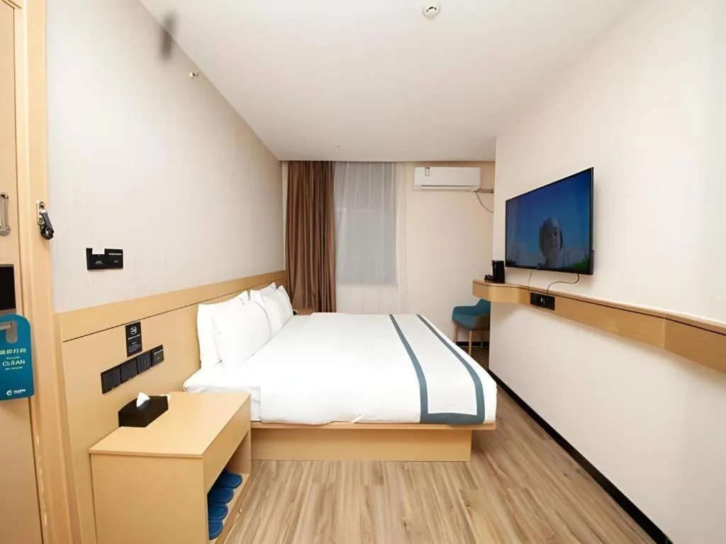 Bed in City Comfort Inn Yulin Wenhua Square Wanda Plaza