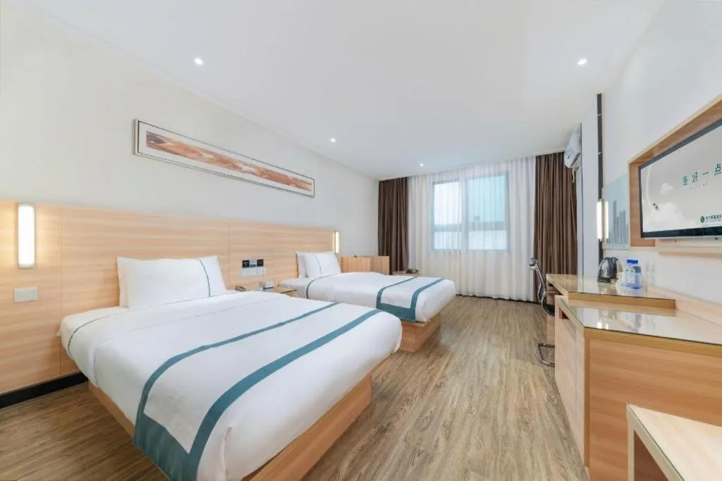 Bed in City Comfort Inn Yulin Wenhua Square Wanda Plaza