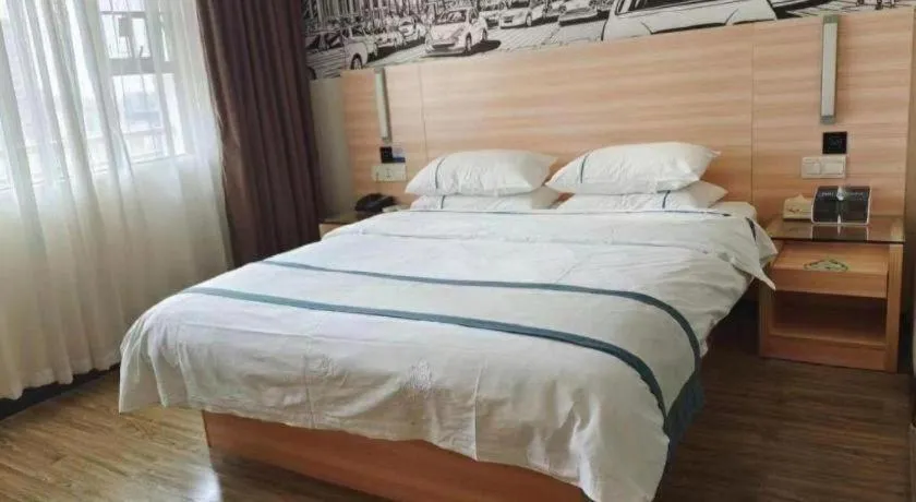 Bed in City Comfort Inn Yulin Wenhua Square Wanda Plaza