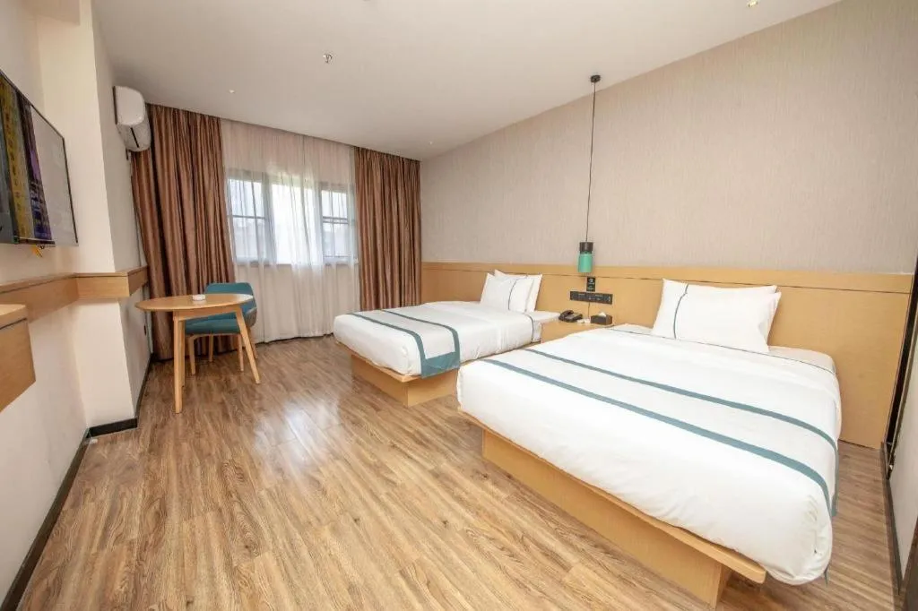 Bed in City Comfort Inn Yulin Wenhua Square Wanda Plaza