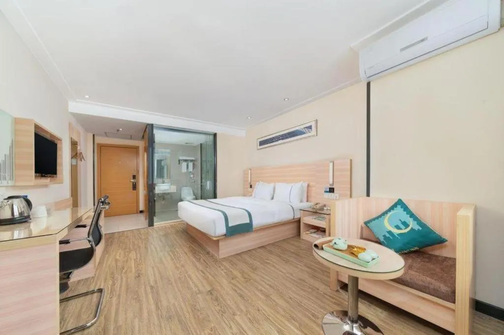 Bed in City Comfort Inn Yulin Wenhua Square Wanda Plaza