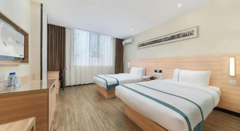 Bed in City Comfort Inn Yulin Wenhua Square Wanda Plaza Bed in City Comfort Inn Yulin Wenhua Square Wanda Plaza