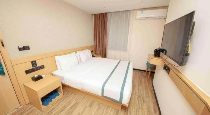 Bed in City Comfort Inn Yulin Wenhua Square Wanda Plaza
