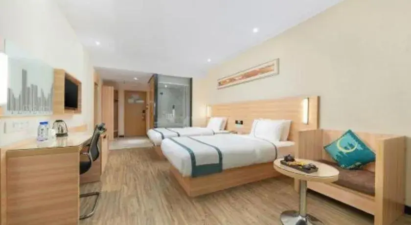 Bed in City Comfort Inn Yulin Wenhua Square Wanda Plaza Bed in City Comfort Inn Yulin Wenhua Square Wanda Plaza