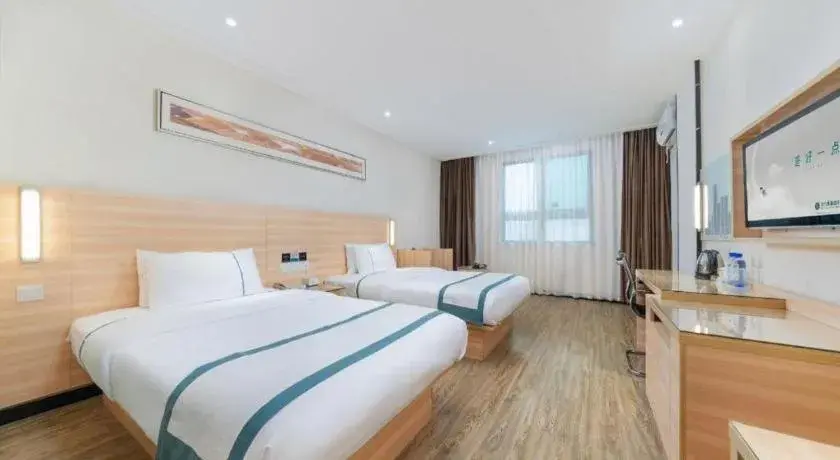 Bed in City Comfort Inn Yulin Wenhua Square Wanda Plaza Bed in City Comfort Inn Yulin Wenhua Square Wanda Plaza