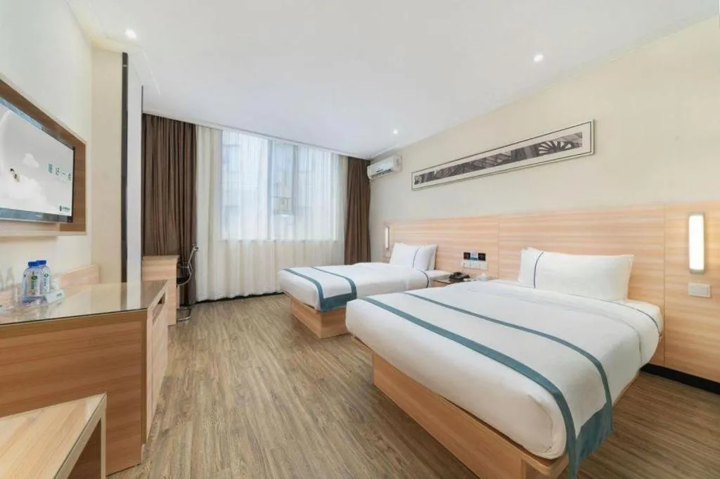 Bed in City Comfort Inn Yulin Wenhua Square Wanda Plaza