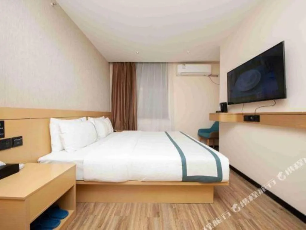 Bed in City Comfort Inn Yulin Wenhua Square Wanda Plaza