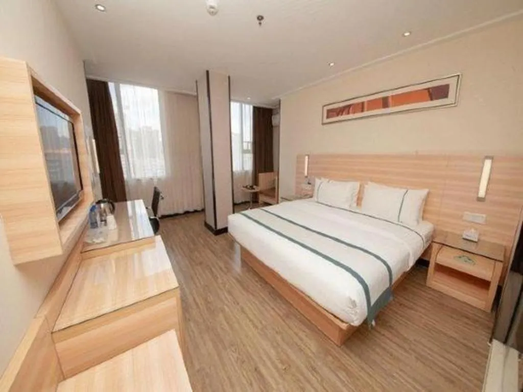 Bed in City Comfort Inn Yulin Wenhua Square Wanda Plaza