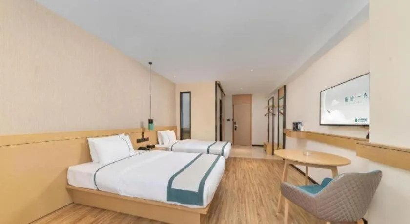 Bed in City Comfort Inn Yulin Wenhua Square Wanda Plaza