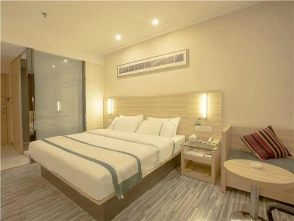 Bed in City Comfort Inn Yulin Wenhua Square Wanda Plaza
