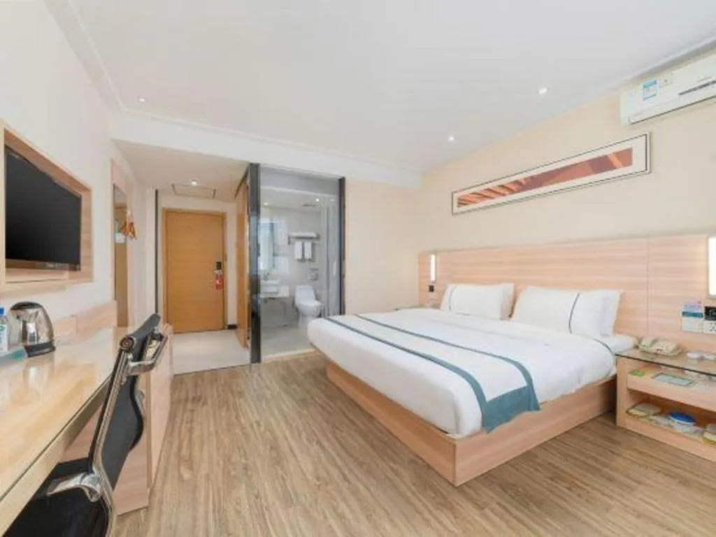 Bed in City Comfort Inn Yulin Wenhua Square Wanda Plaza