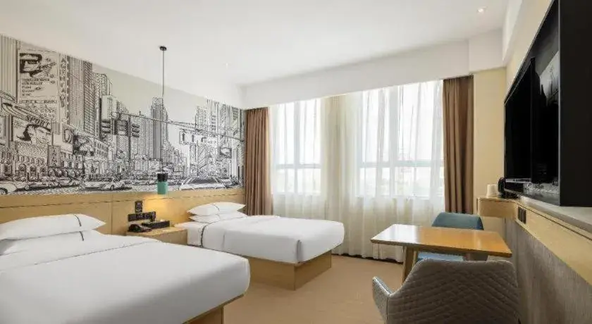 Bed in City Comfort Inn Yulin Wenhua Square Wanda Plaza Bed in City Comfort Inn Yulin Wenhua Square Wanda Plaza