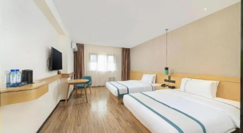 Bed in City Comfort Inn Yulin Wenhua Square Wanda Plaza