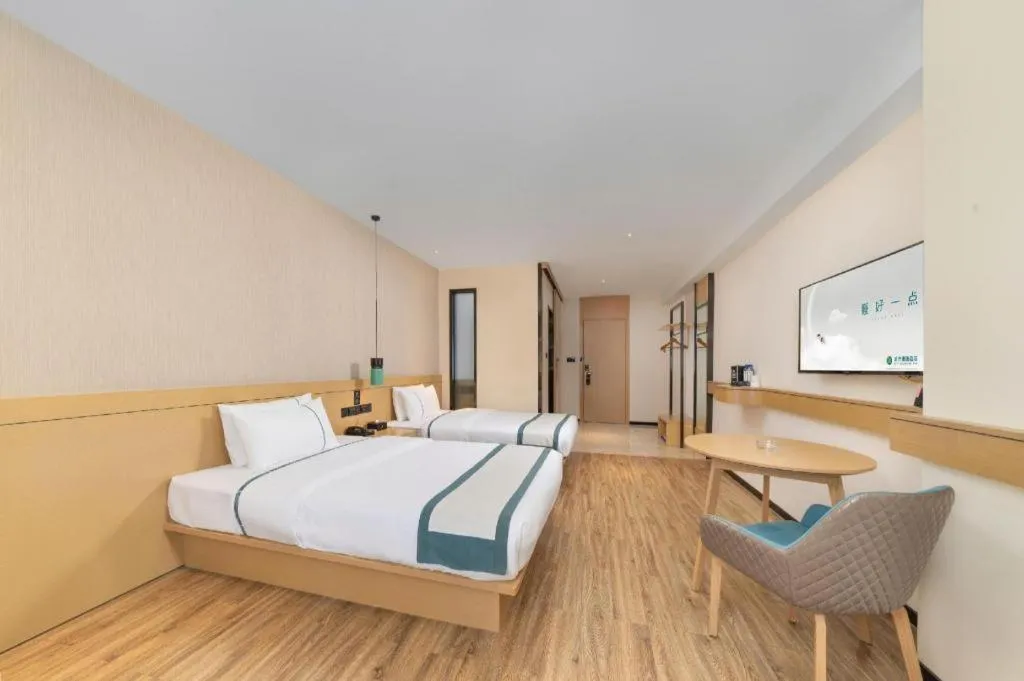 Bed in City Comfort Inn Yulin Wenhua Square Wanda Plaza