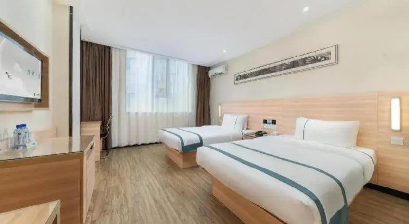 Bed in City Comfort Inn Yulin Wenhua Square Wanda Plaza Bed in City Comfort Inn Yulin Wenhua Square Wanda Plaza
