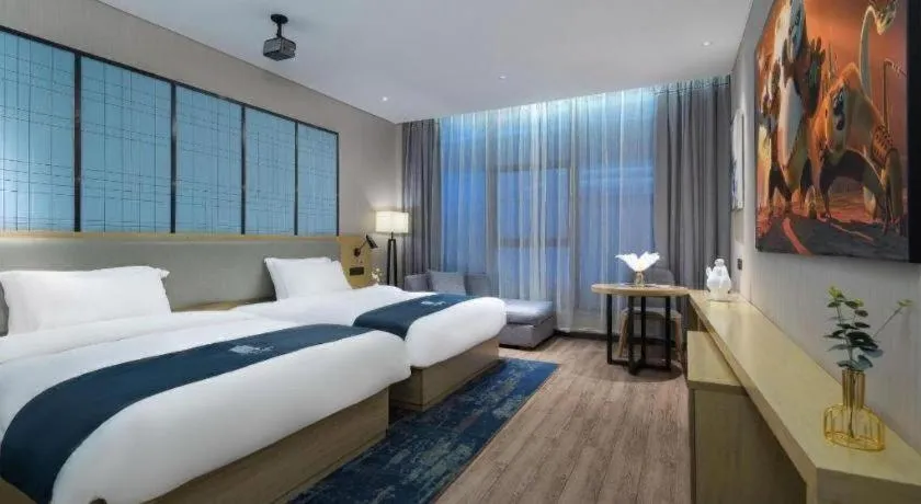 Bed in Echarm Hotel Danzhou Xiari Plaza