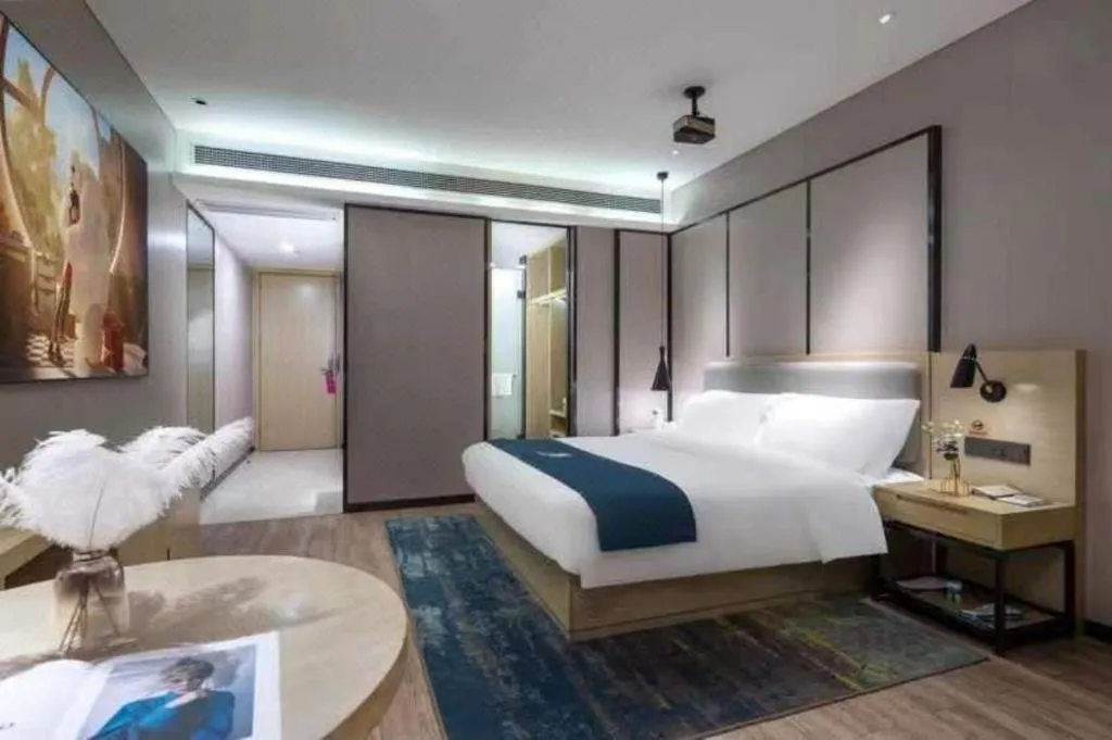 Bed in Echarm Hotel Danzhou Xiari Plaza