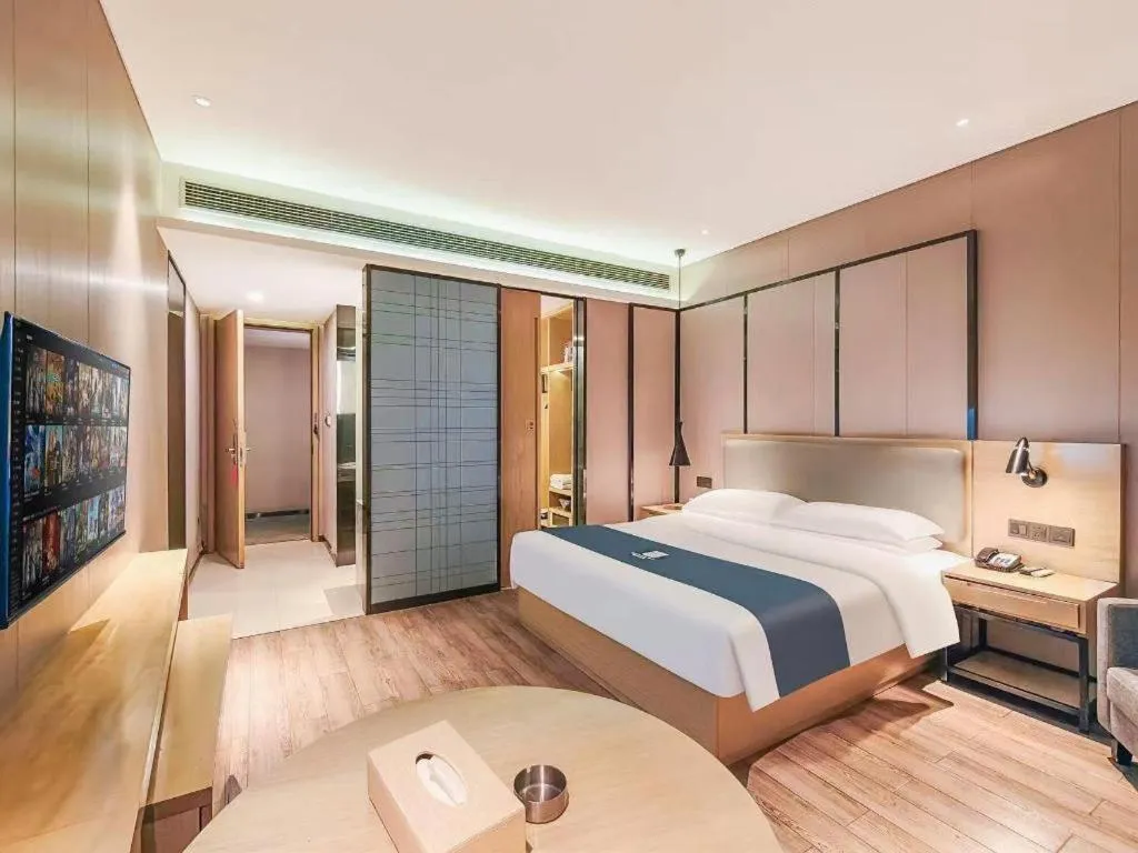 Bed in Echarm Hotel Danzhou Xiari Plaza