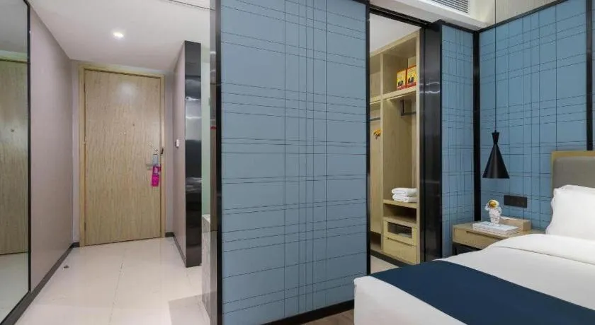 Bed in Echarm Hotel Danzhou Xiari Plaza