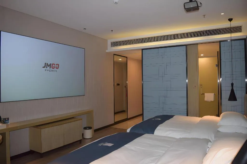 Bed in Echarm Hotel Danzhou Xiari Plaza