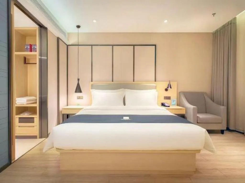 Bed in Echarm Hotel Danzhou Xiari Plaza