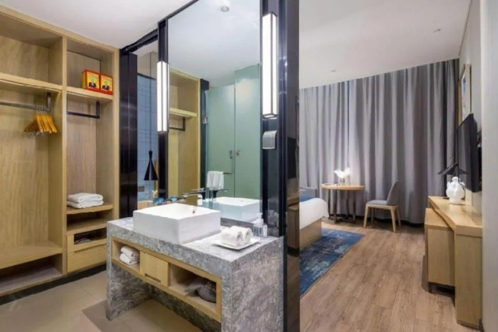 Bed in Echarm Hotel Danzhou Xiari Plaza