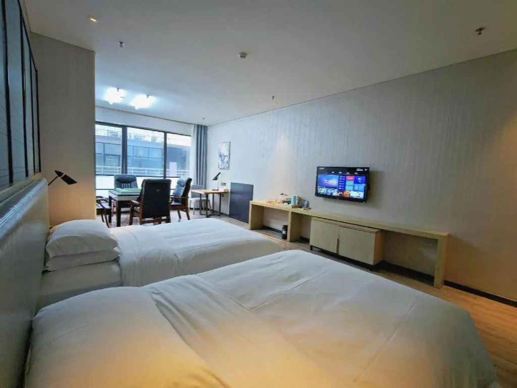 Bed in Echarm Hotel Danzhou Xiari Plaza