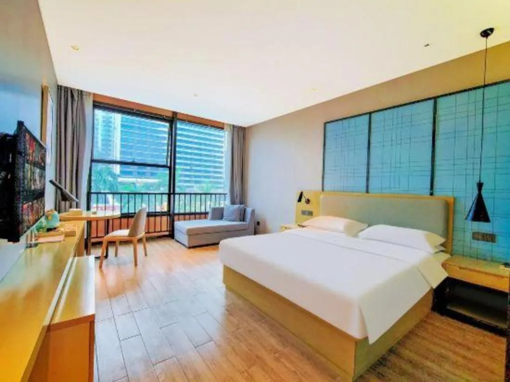 Bed in Echarm Hotel Danzhou Xiari Plaza