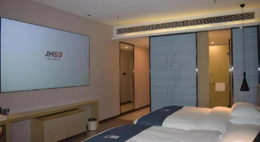 Bed in Echarm Hotel Danzhou Xiari Plaza