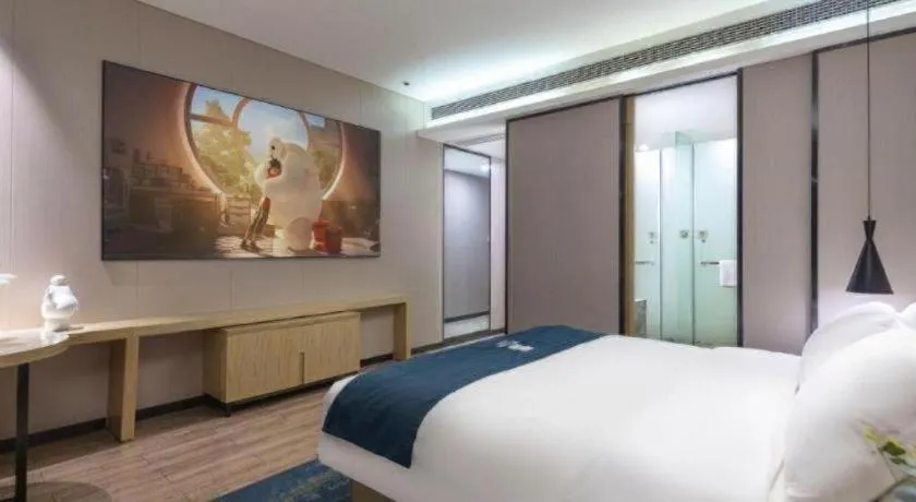 Bed in Echarm Hotel Danzhou Xiari Plaza
