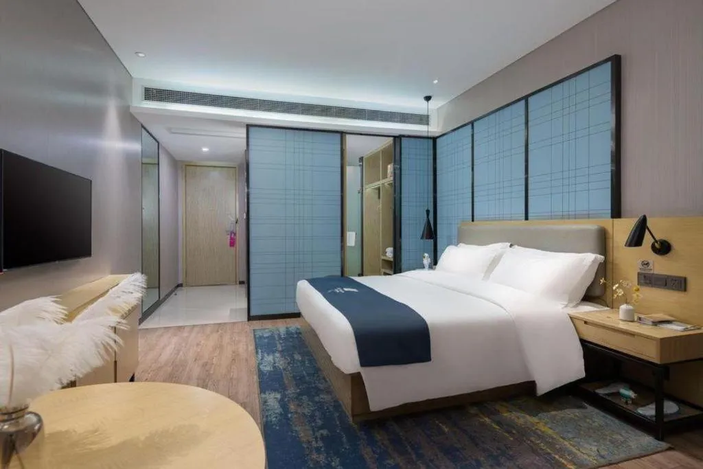 Bed in Echarm Hotel Danzhou Xiari Plaza