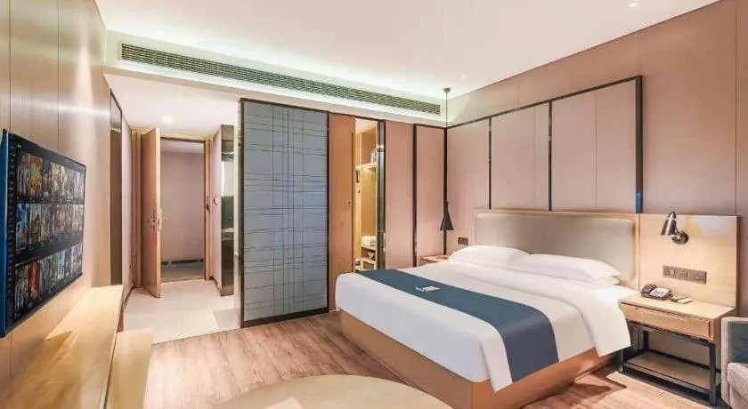 Bed in Echarm Hotel Danzhou Xiari Plaza