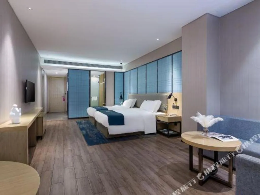 Bed in Echarm Hotel Danzhou Xiari Plaza