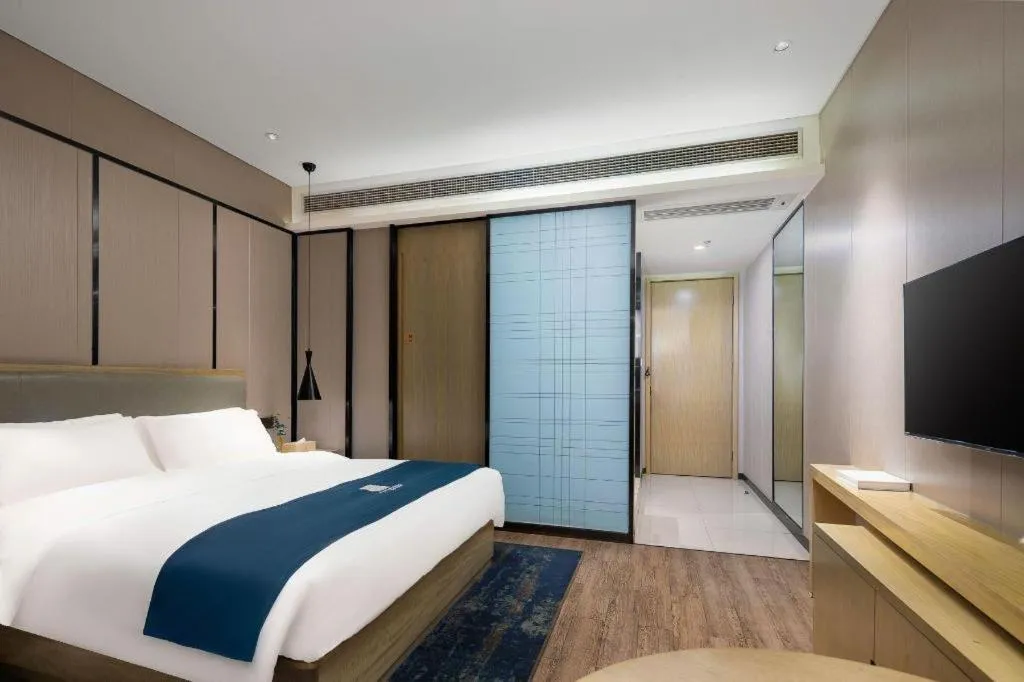 Bed in Echarm Hotel Danzhou Xiari Plaza