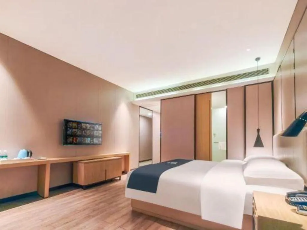 Bed in Echarm Hotel Danzhou Xiari Plaza