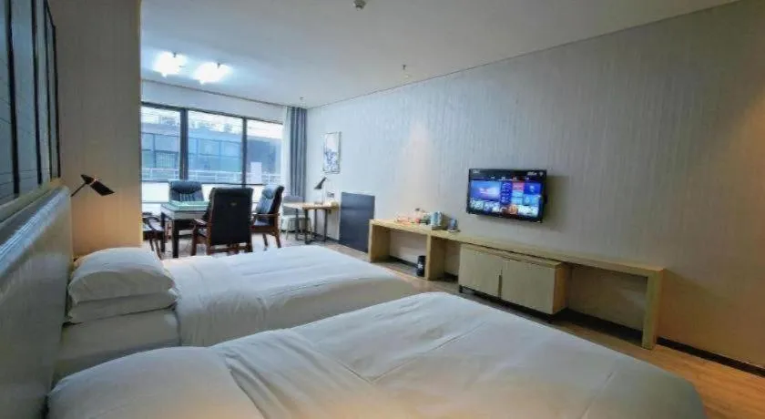 Bed in Echarm Hotel Danzhou Xiari Plaza