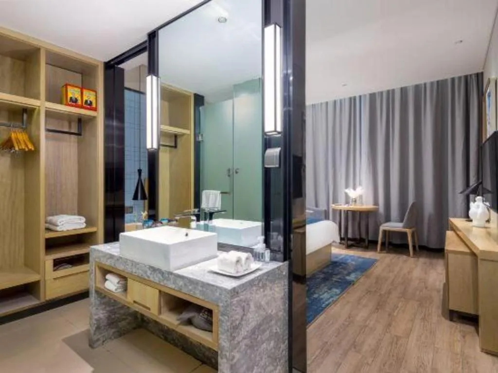 Bed in Echarm Hotel Danzhou Xiari Plaza