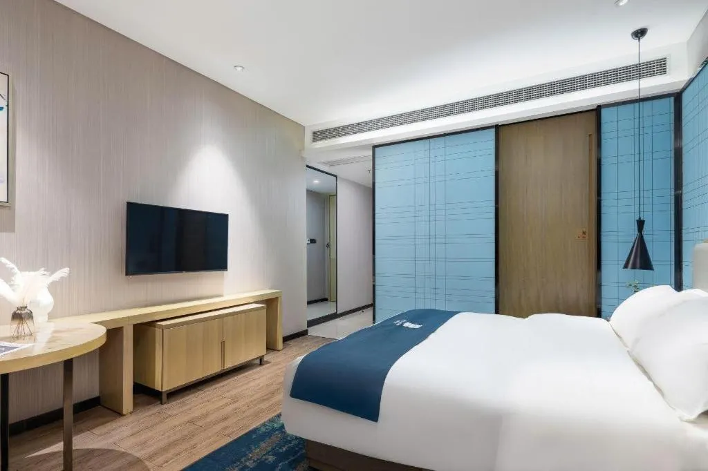 Bed in Echarm Hotel Danzhou Xiari Plaza