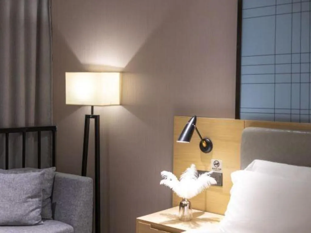 Bed in Echarm Hotel Danzhou Xiari Plaza