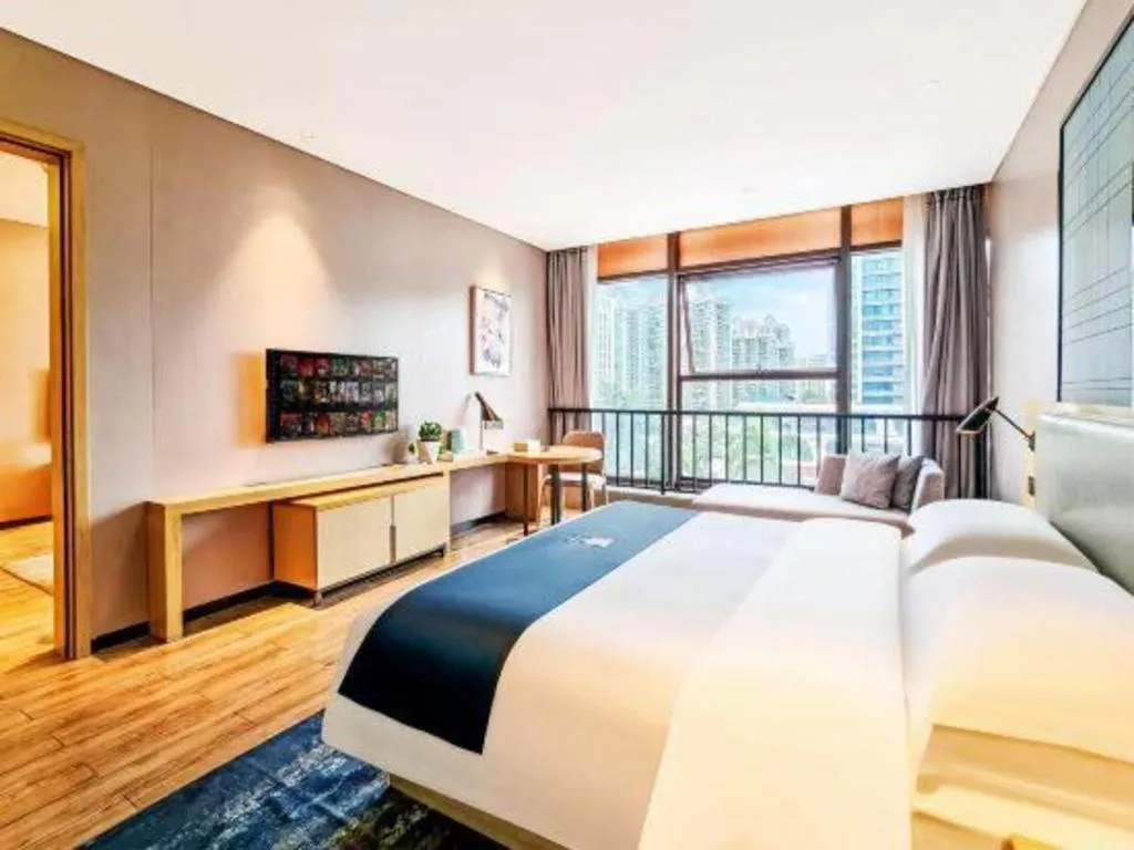 Bed in Echarm Hotel Danzhou Xiari Plaza