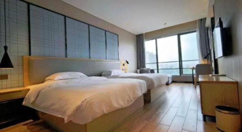 Bed in Echarm Hotel Danzhou Xiari Plaza