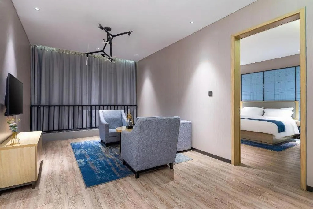 Bed in Echarm Hotel Danzhou Xiari Plaza