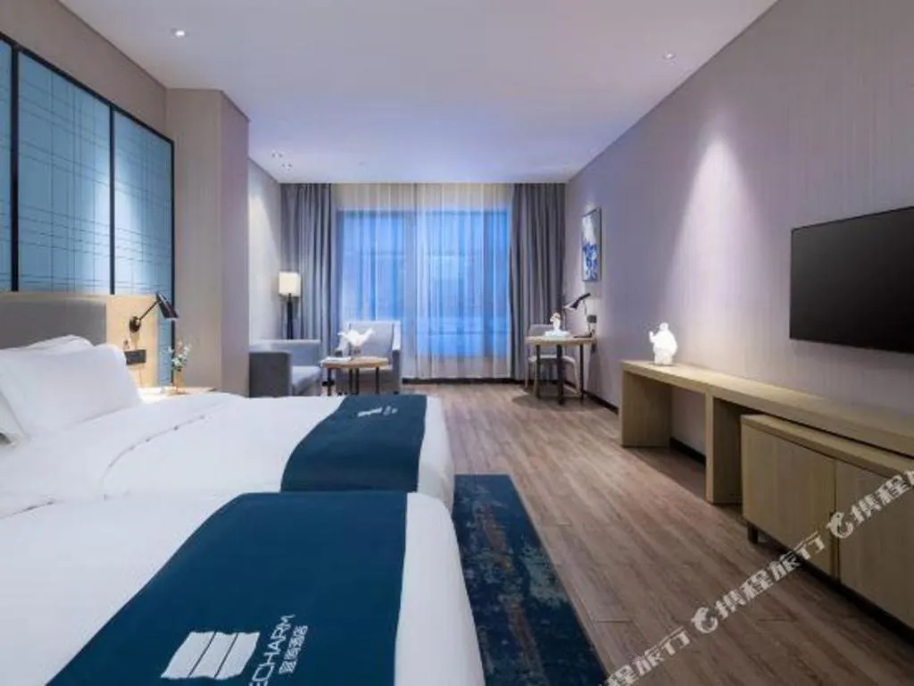 Bed in Echarm Hotel Danzhou Xiari Plaza