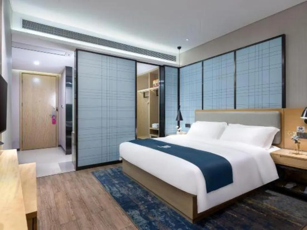Bed in Echarm Hotel Danzhou Xiari Plaza