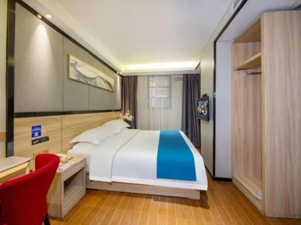 Bed in Wenxing Hotel Guangzhou Gangding Metro Station Branch