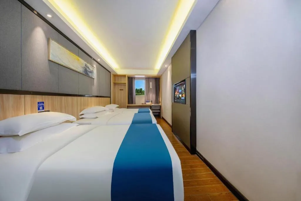 Bed in Wenxing Hotel Guangzhou Gangding Metro Station Branch