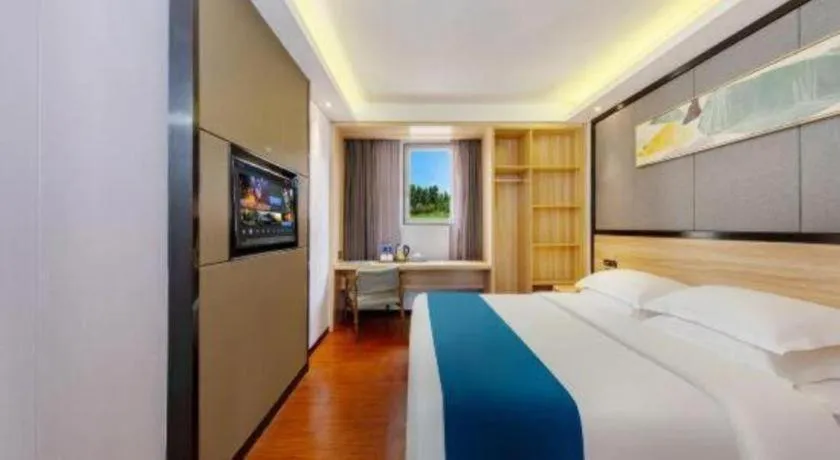 Bed in Wenxing Hotel Guangzhou Gangding Metro Station Branch